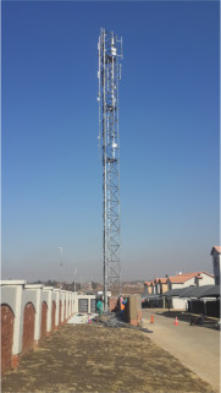 Narrow based parallel towers for erection in confined spaces.