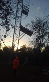 Rural Concreteless Lattice Tower - Solar panels being installed