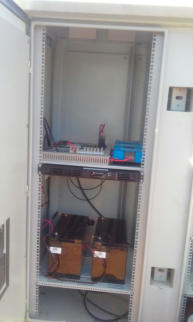 Rural Concreteless Lattice Tower - Batteries being installed in shelter